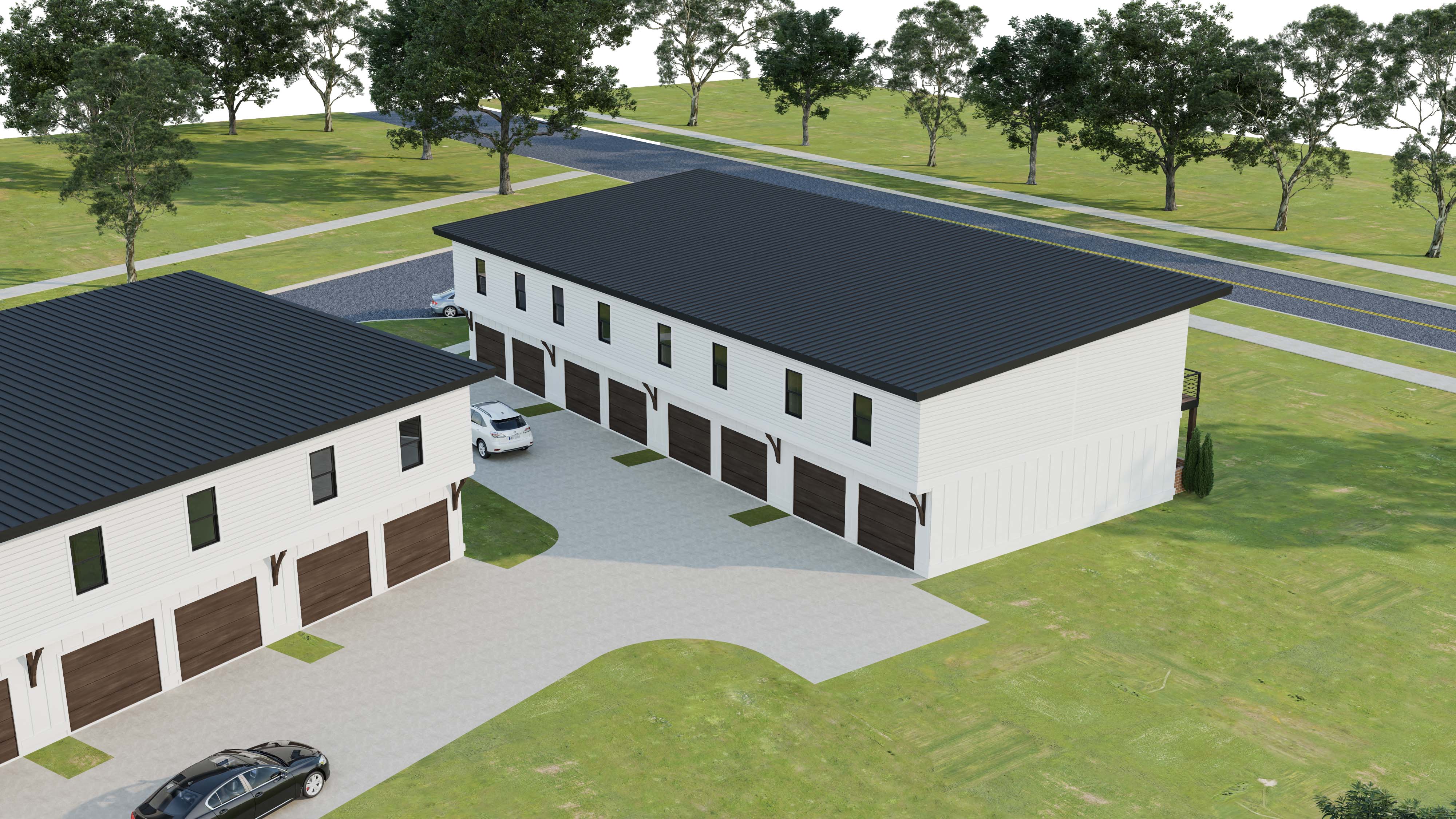 white townhome building with garages in Tuscaloosa, AL - Conceptual drawing of River District Towmnhomes